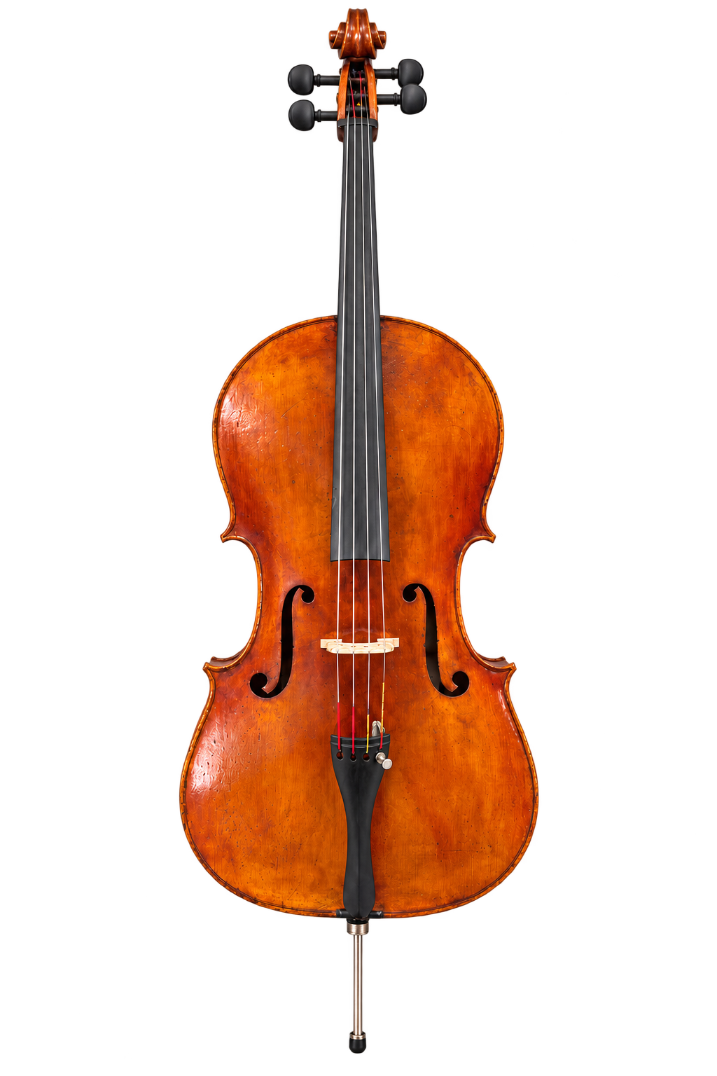 Front view of the cello bearing an M. Couturieux label, with reddish-brown and amber varnish